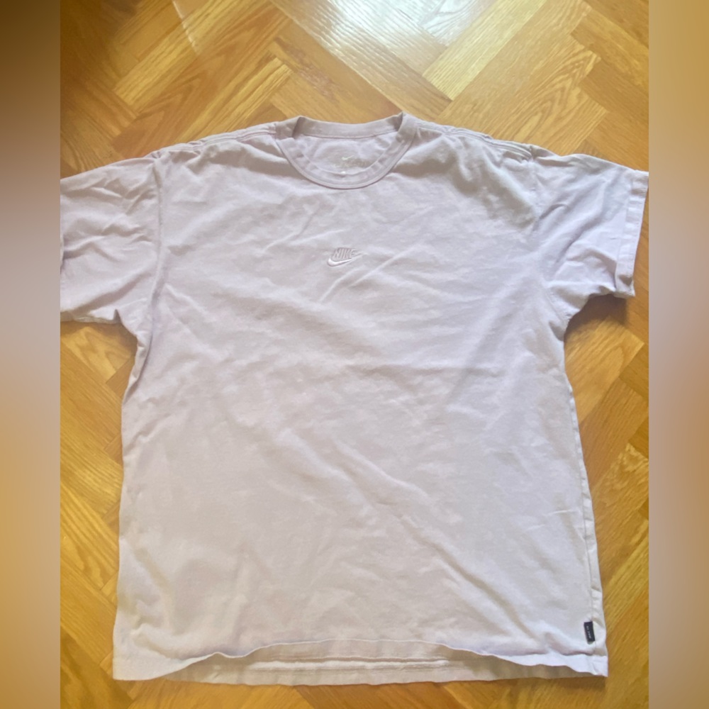The Nike tee size Large